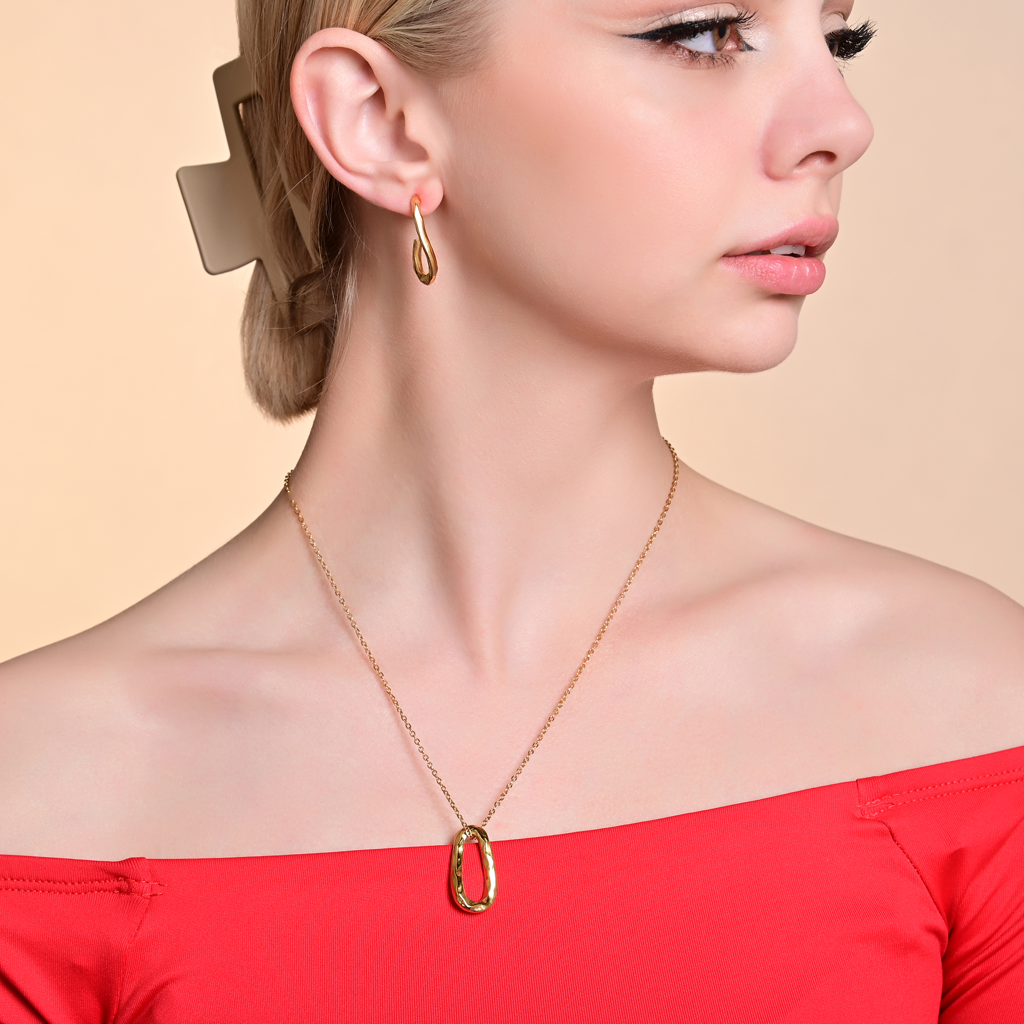"Leila" Edelstahl Schmuckset mit Ohrsteckern und Anhänger, goldfarben